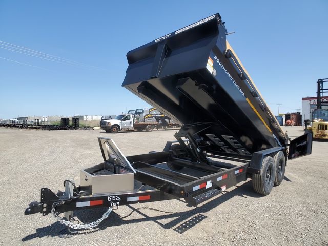 Dump trailer with bed raised